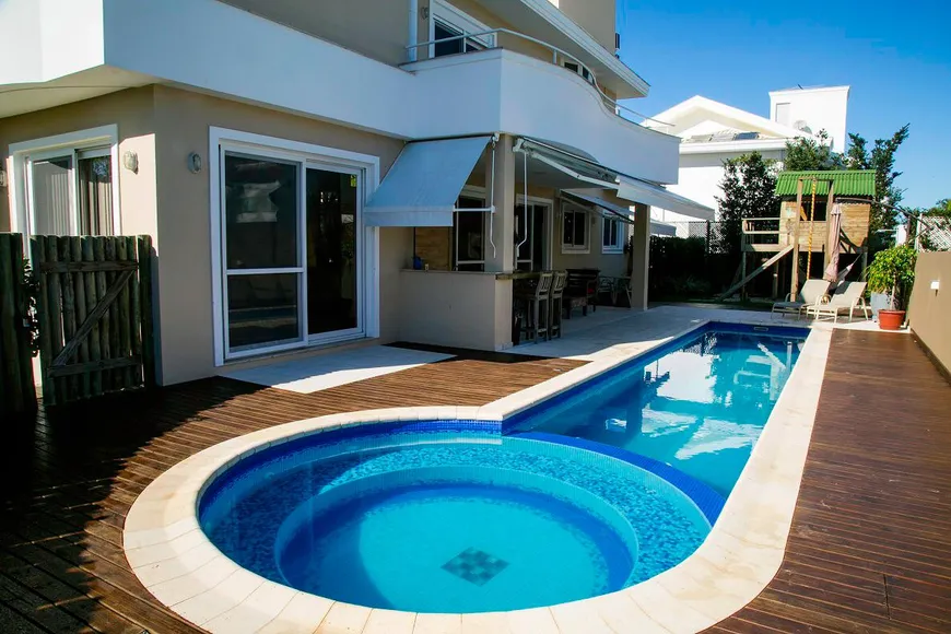 Foto 1 de Casa com 4 Quartos para alugar, 437m² em Jurerê, Florianópolis