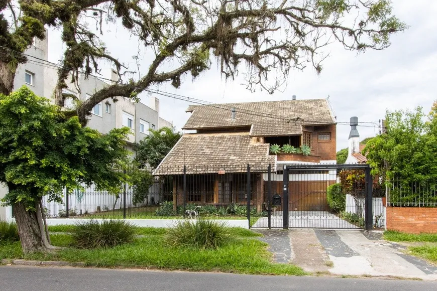 Foto 1 de Casa com 5 Quartos à venda, 249m² em Tristeza, Porto Alegre