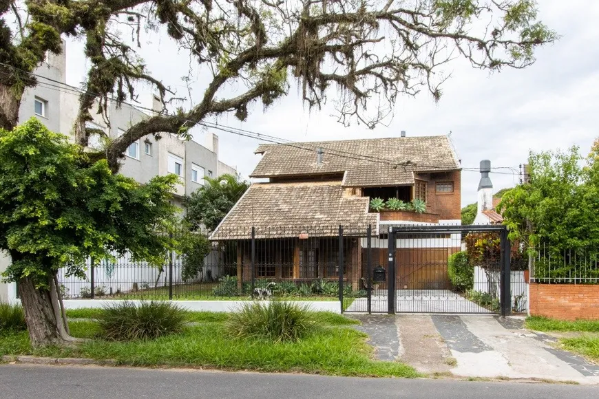 Foto 1 de Casa com 5 Quartos à venda, 250m² em Tristeza, Porto Alegre
