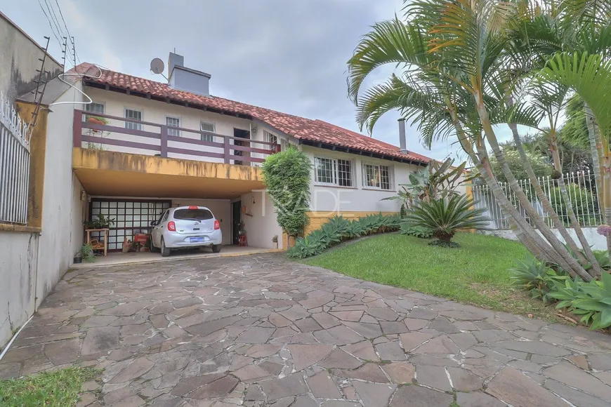 Foto 1 de Casa com 4 Quartos à venda, 230m² em Jardim Isabel, Porto Alegre