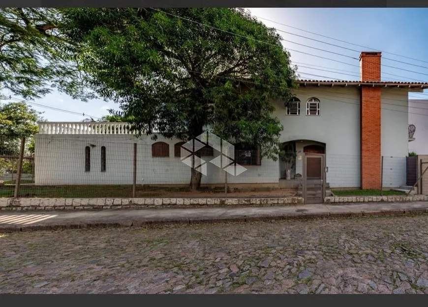 Foto 1 de Casa com 4 Quartos à venda, 291m² em Vila Assunção, Porto Alegre
