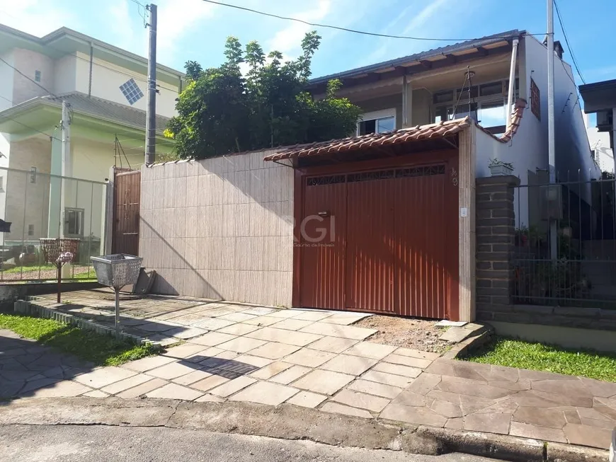 Foto 1 de Casa com 3 Quartos à venda, 191m² em Vila Nova, Porto Alegre