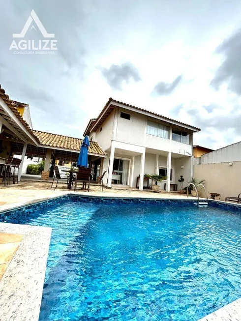 Foto 1 de Casa com 5 Quartos à venda, 459m² em Riviera Fluminense, Macaé