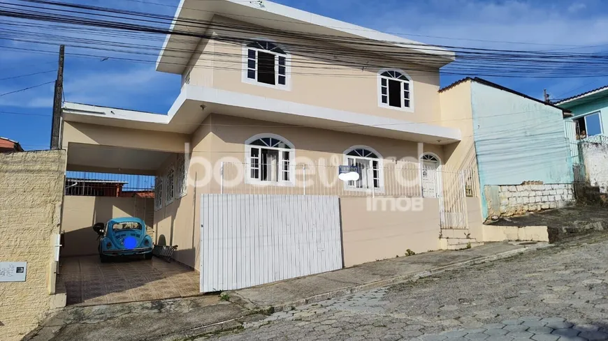 Foto 1 de Casa com 4 Quartos à venda, 125m² em Monte Cristo, Florianópolis