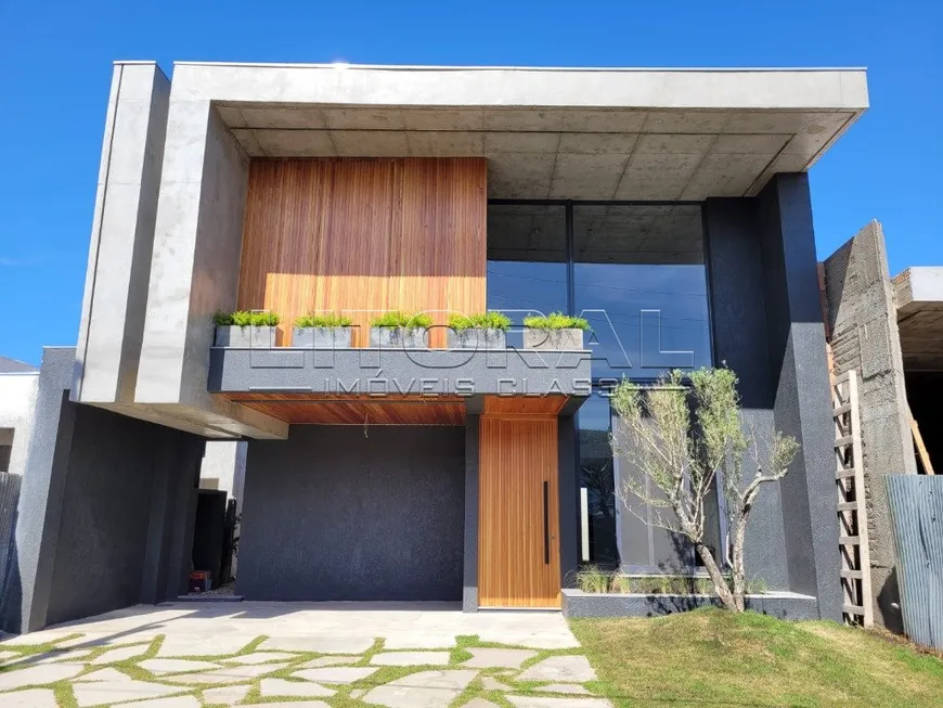 Foto 1 de Casa de Condomínio com 4 Quartos à venda, 200m² em Centro, Xangri-lá