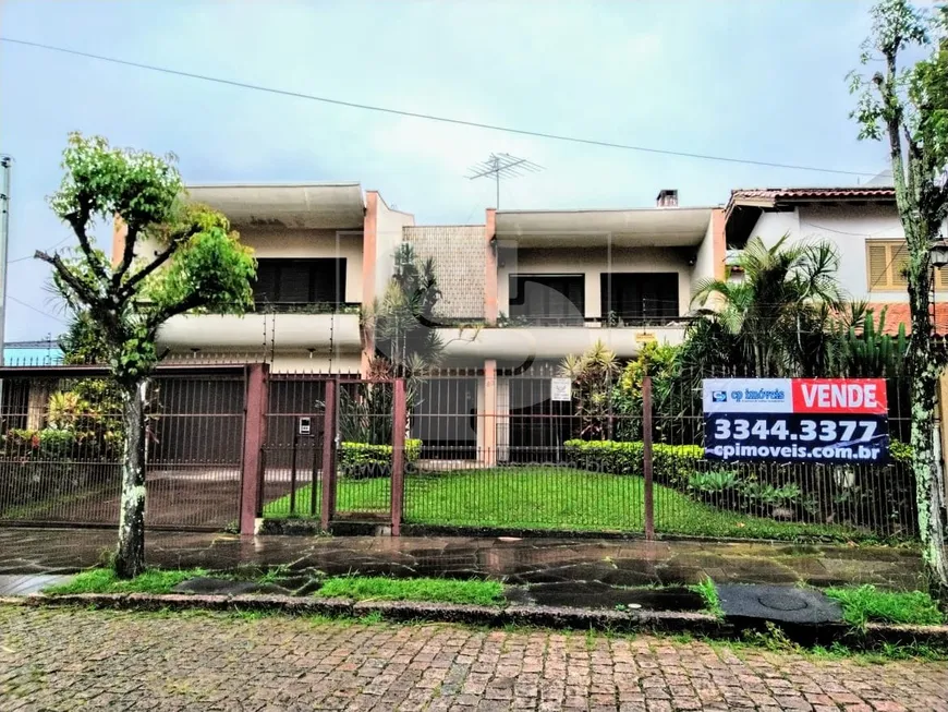 Foto 1 de Casa com 5 Quartos à venda, 536m² em Jardim Lindóia, Porto Alegre