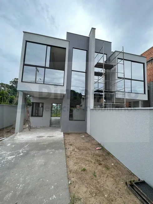 Foto 1 de Sobrado com 3 Quartos à venda, 115m² em São João do Rio Vermelho, Florianópolis