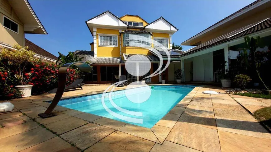 Foto 1 de Casa com 6 Quartos à venda, 450m² em Barra da Tijuca, Rio de Janeiro