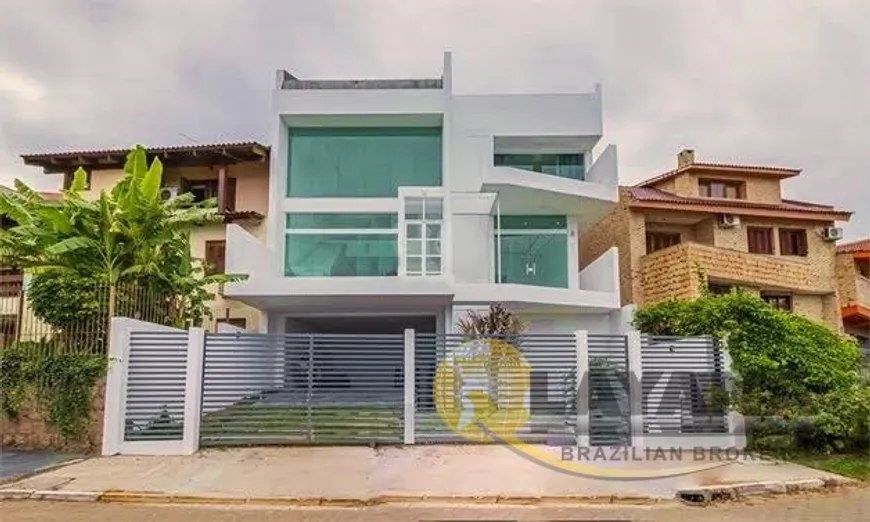 Foto 1 de Casa de Condomínio com 3 Quartos à venda, 326m² em Nonoai, Porto Alegre