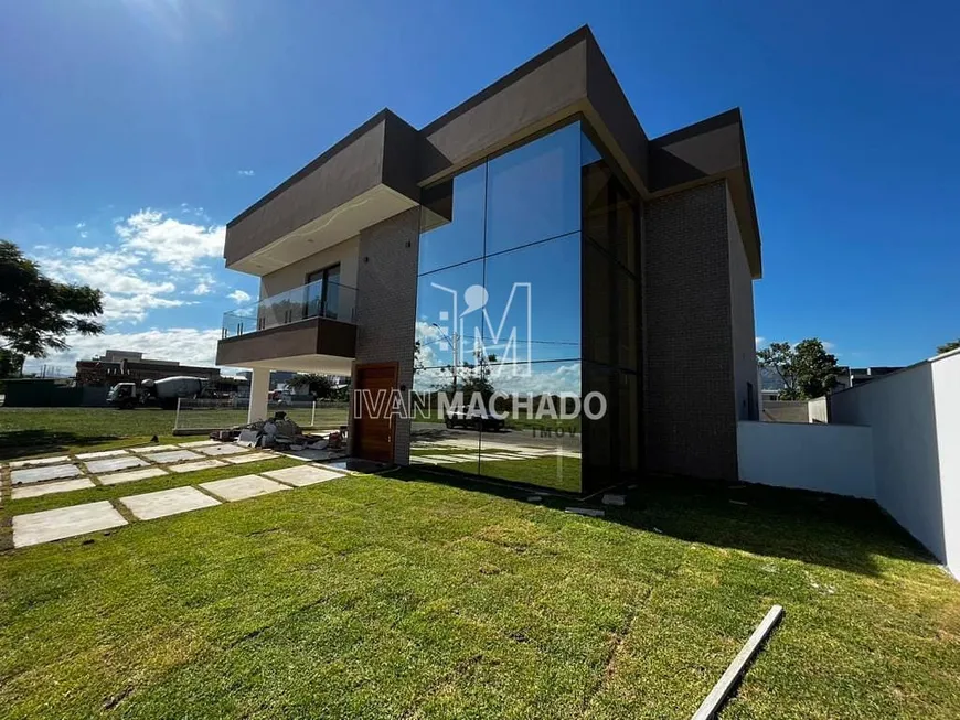 Foto 1 de Casa de Condomínio com 4 Quartos à venda, 375m² em Rosário de Fátima, Serra