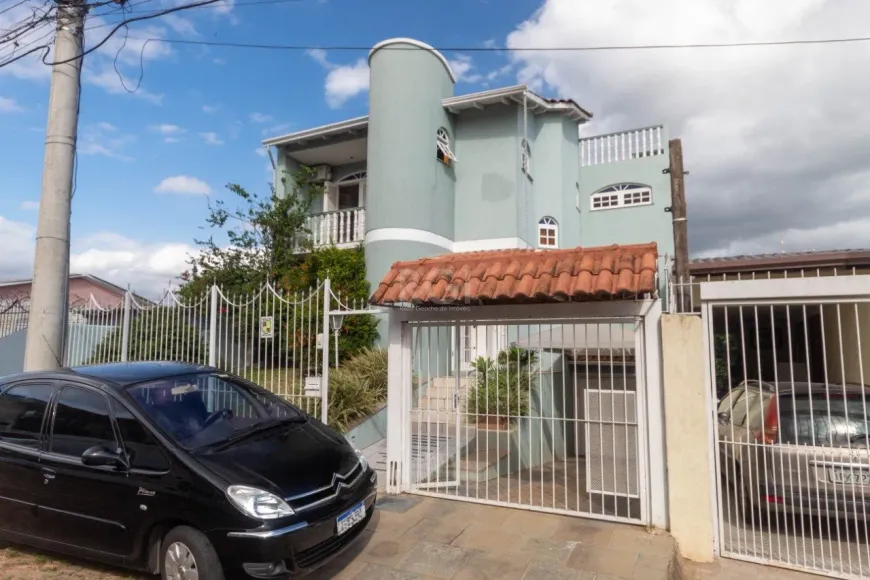 Foto 1 de Casa com 3 Quartos à venda, 251m² em Partenon, Porto Alegre