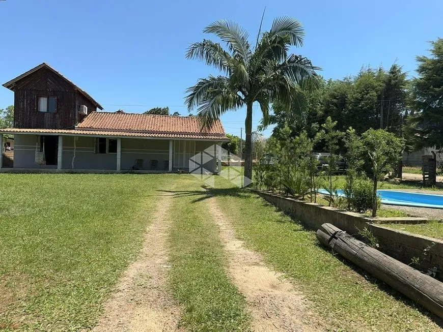 Foto 1 de Casa de Condomínio com 3 Quartos à venda, 290m² em Águas Claras, Viamão