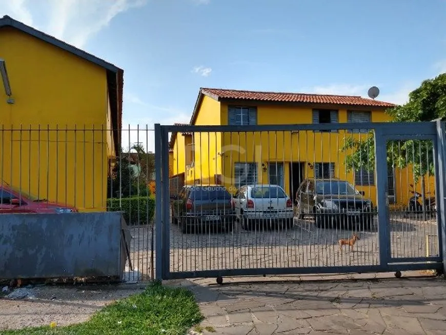 Foto 1 de Casa de Condomínio com 2 Quartos à venda, 37m² em Vila Nova, Porto Alegre