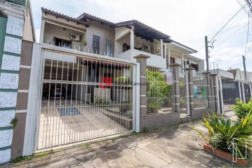 Foto 1 de Casa com 4 Quartos à venda, 195m² em Estância Velha, Canoas