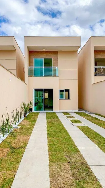Foto 1 de Casa com 3 Quartos à venda, 93m² em Coacu, Eusébio