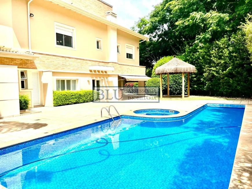 Foto 1 de Casa de Condomínio com 4 Quartos para venda ou aluguel, 450m² em Loteamento Alphaville Campinas, Campinas