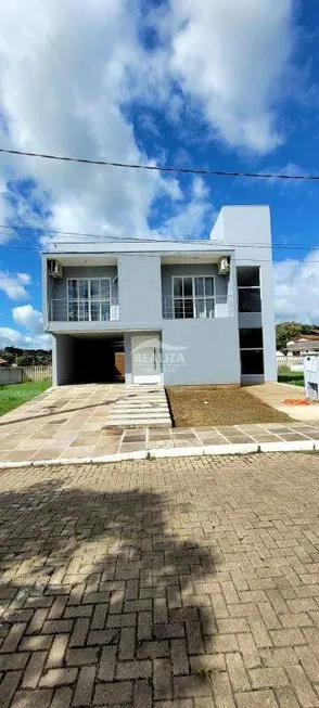 Foto 1 de Casa de Condomínio com 3 Quartos à venda, 232m² em Tarumã, Viamão