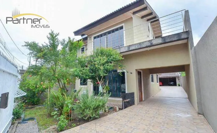 Foto 1 de Casa com 4 Quartos à venda, 359m² em Novo Mundo, Curitiba