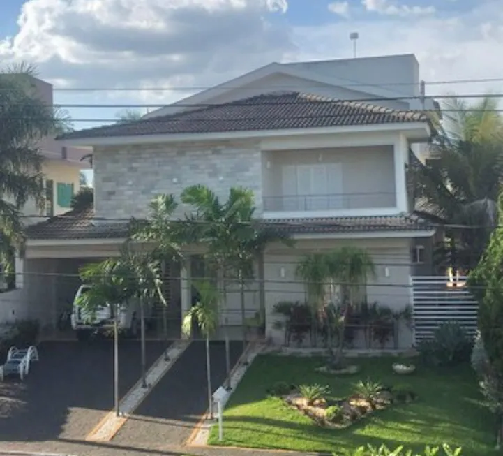 Foto 1 de Casa de Condomínio com 5 Quartos à venda, 418m² em Condomínio do Lago, Goiânia