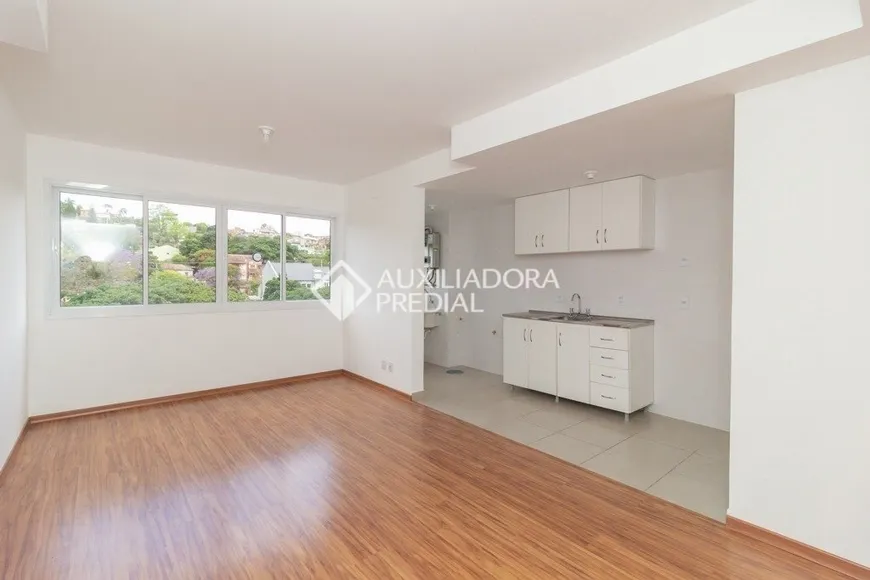 Foto 1 de Apartamento com 2 Quartos à venda, 60m² em Teresópolis, Porto Alegre