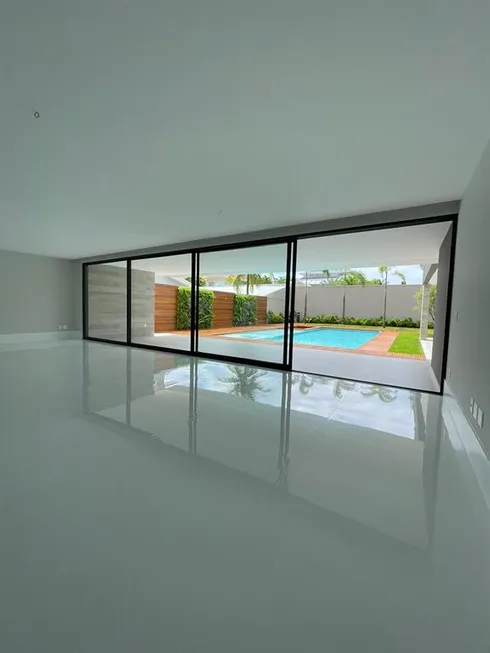 Foto 1 de Casa de Condomínio com 5 Quartos à venda, 1200m² em Barra da Tijuca, Rio de Janeiro