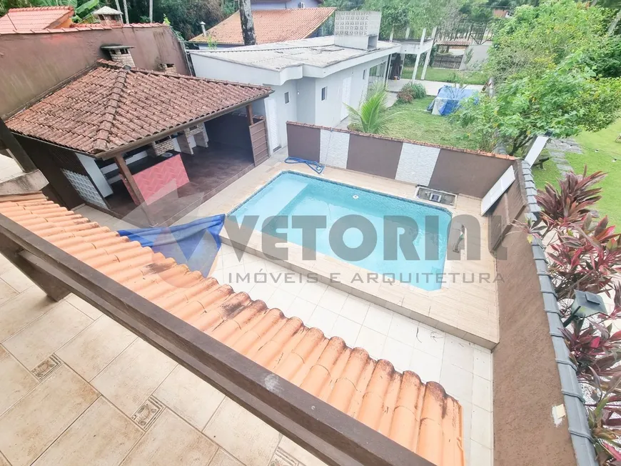 Foto 1 de Casa de Condomínio com 5 Quartos à venda, 250m² em Massaguaçu, Caraguatatuba