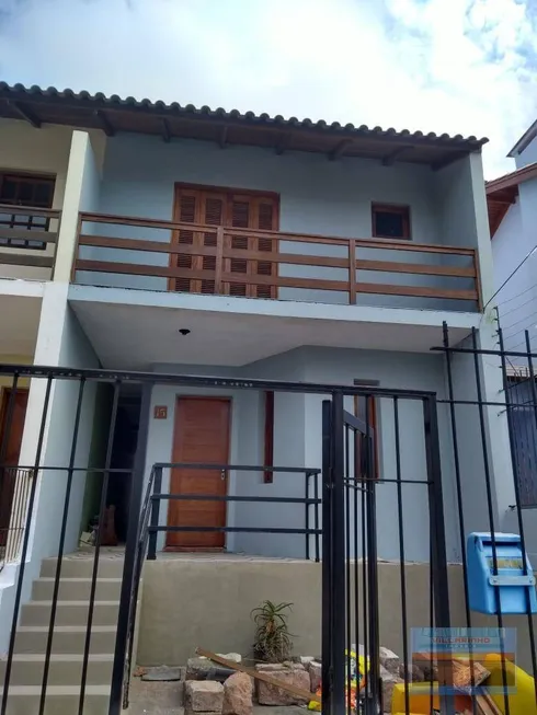 Foto 1 de Casa de Condomínio com 2 Quartos à venda, 103m² em Guarujá, Porto Alegre
