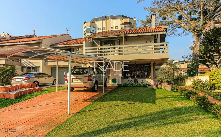 Foto 1 de Casa de Condomínio com 3 Quartos à venda, 210m² em Tristeza, Porto Alegre