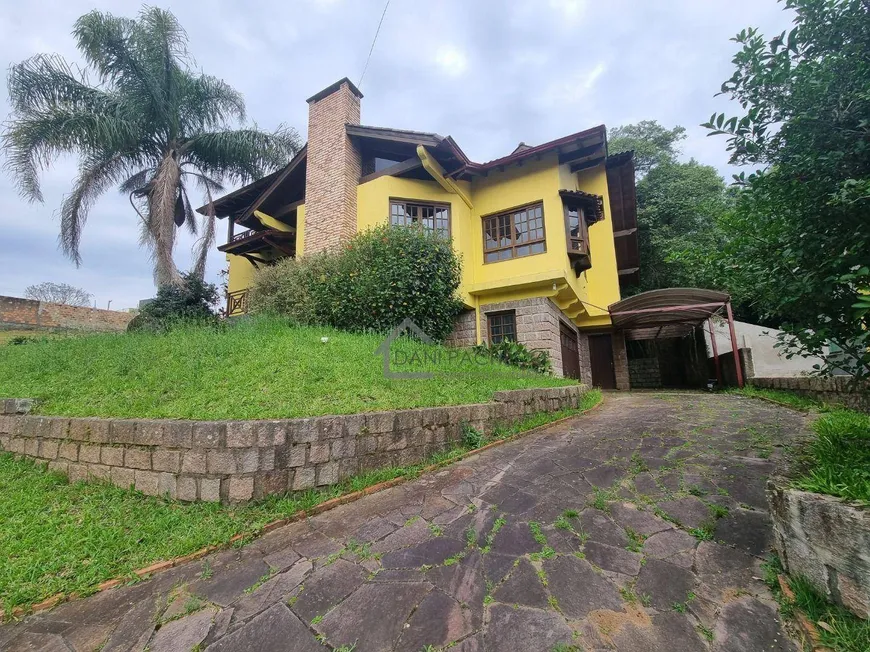Foto 1 de Casa de Condomínio com 5 Quartos para venda ou aluguel, 375m² em Centro, Viamão