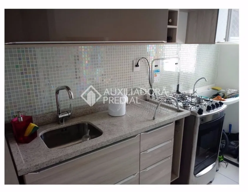 Foto 1 de Apartamento com 2 Quartos à venda, 51m² em Vila Nova, Porto Alegre