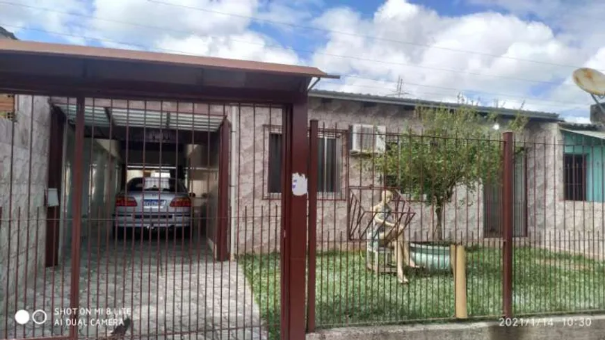 Foto 1 de Casa com 2 Quartos à venda, 96m² em Guajuviras, Canoas