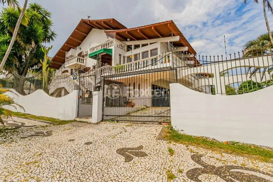 Foto 1 de Casa com 4 Quartos à venda, 903m² em Vila Jardim, Porto Alegre