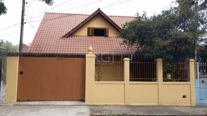 Foto 1 de Casa com 3 Quartos à venda, 249m² em Jardim Botânico, Porto Alegre