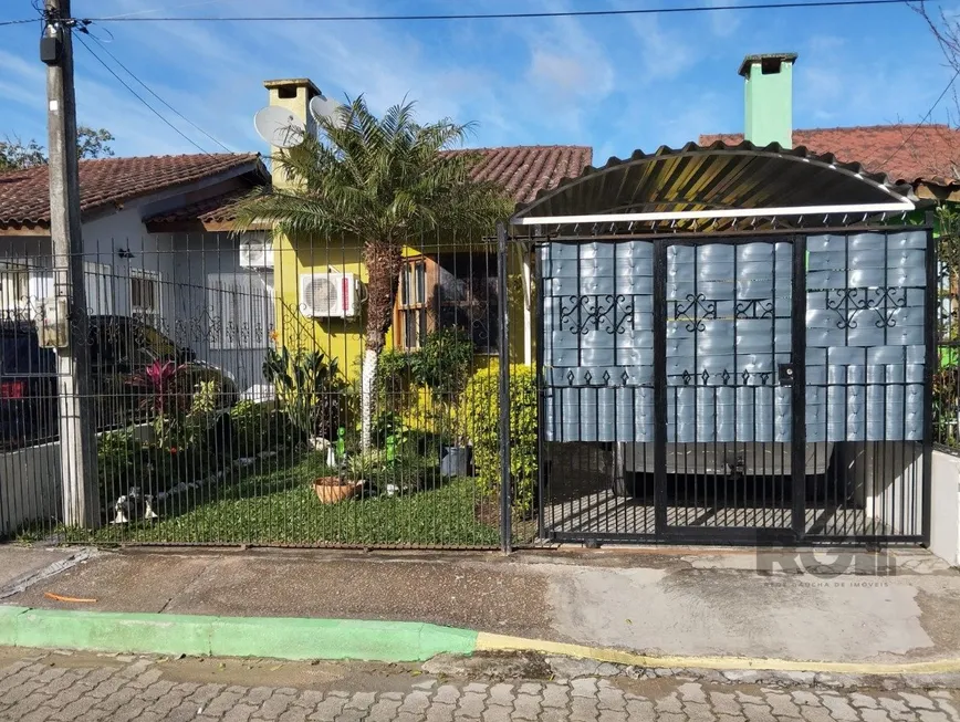 Foto 1 de Casa de Condomínio com 2 Quartos à venda, 108m² em Restinga, Porto Alegre