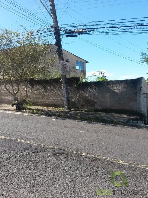 Foto 1 de Lote/Terreno à venda, 477m² em Barreiros, São José