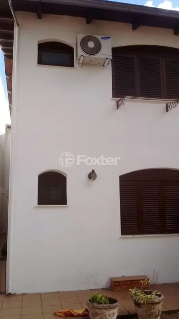 Foto 1 de Casa com 4 Quartos à venda, 165m² em Santa Cecília, Porto Alegre