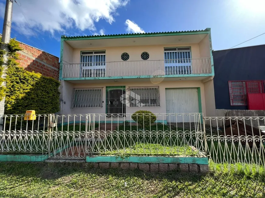 Foto 1 de Casa com 4 Quartos à venda, 295m² em Morro Santana, Porto Alegre