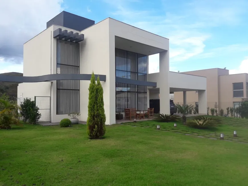 Foto 1 de Casa de Condomínio com 4 Quartos à venda, 360m² em Balneario Água Limpa, Nova Lima