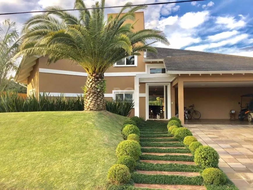 Foto 1 de Casa com 4 Quartos à venda, 414m² em Belém Novo, Porto Alegre