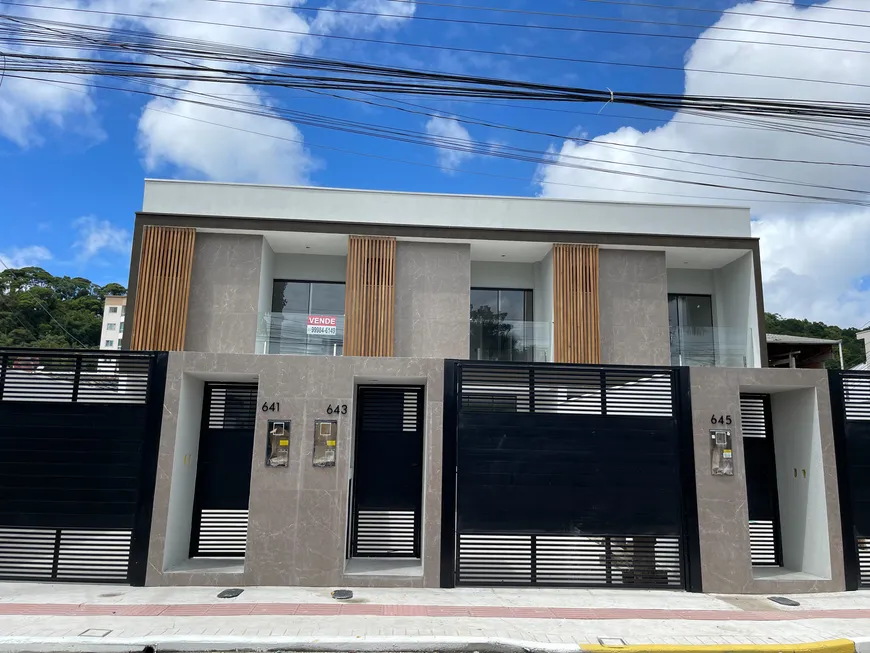 Foto 1 de Sobrado com 3 Quartos à venda, 116m² em Tabuleiro, Camboriú