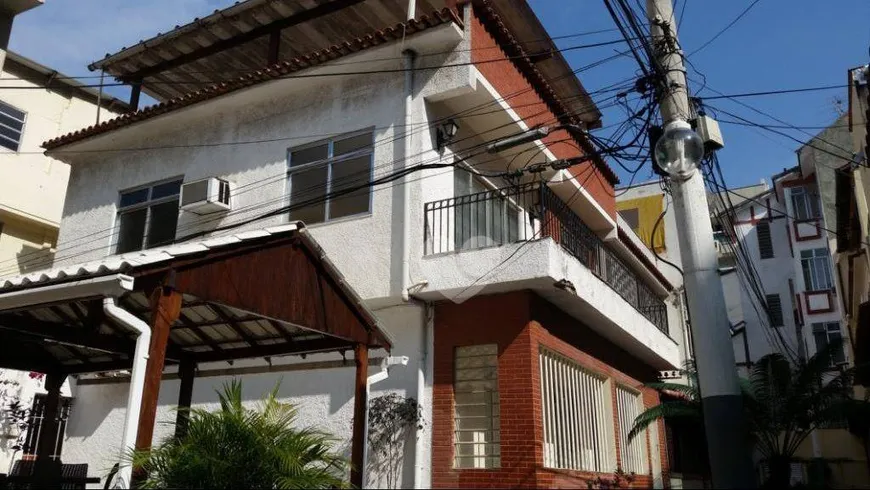 Foto 1 de Casa com 4 Quartos à venda, 165m² em Grajaú, Rio de Janeiro