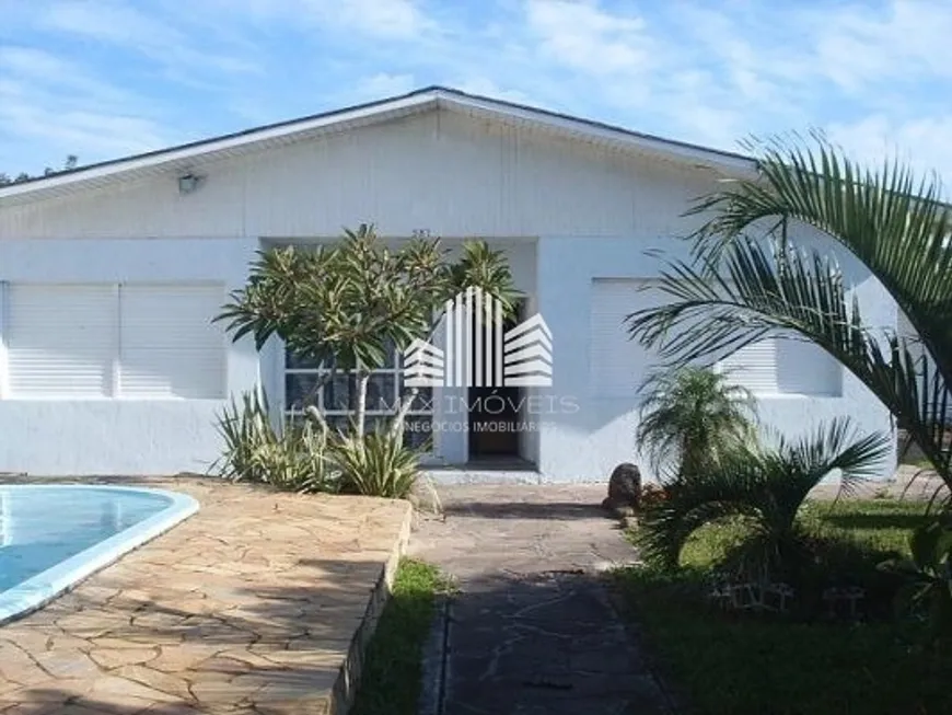 Foto 1 de Casa com 4 Quartos à venda, 200m² em Centro, Xangri-lá