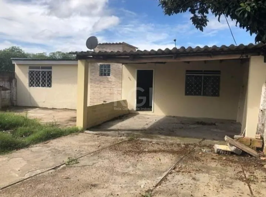 Foto 1 de Casa com 2 Quartos à venda, 71m² em Vila Nova, Porto Alegre