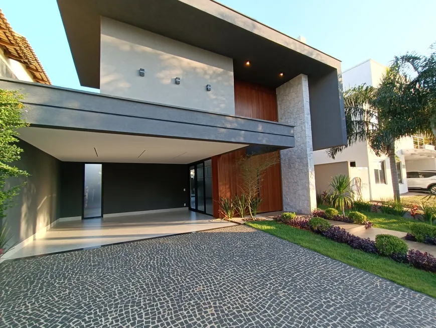 Foto 1 de Casa de Condomínio com 5 Quartos à venda, 377m² em Jardins Madri, Goiânia