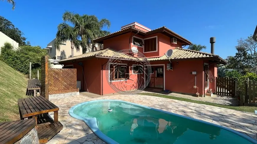 Foto 1 de Casa de Condomínio com 4 Quartos à venda, 630m² em Rio Tavares, Florianópolis