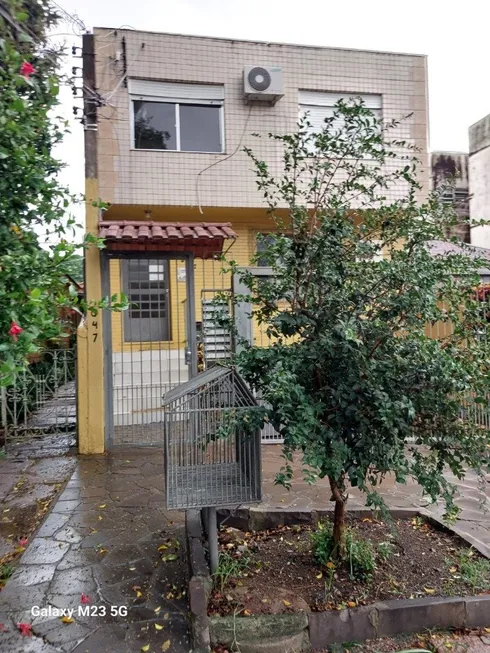 Foto 1 de Apartamento com 2 Quartos à venda, 73m² em Santo Antônio, Porto Alegre