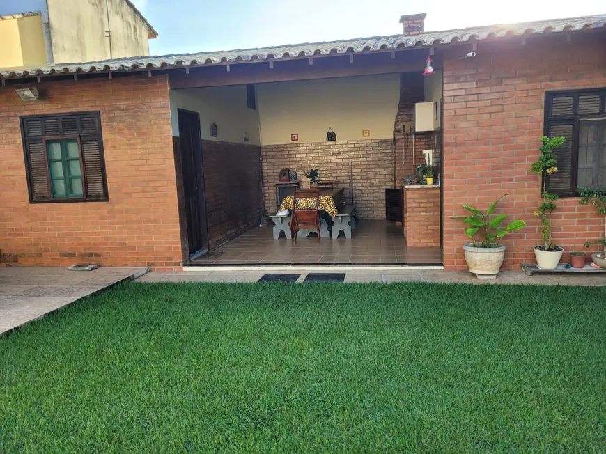 Foto 1 de Casa com 3 Quartos à venda, 87m² em Orla 500 Tamoios, Cabo Frio