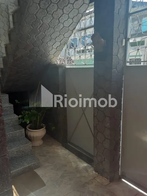 Foto 1 de Casa com 4 Quartos à venda, 242m² em Realengo, Rio de Janeiro