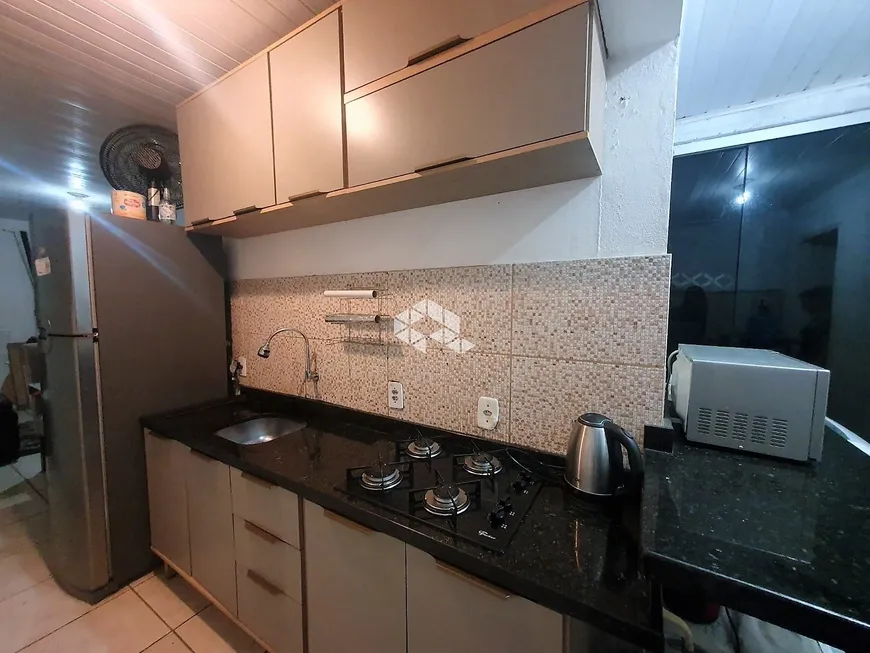 Foto 1 de Casa de Condomínio com 3 Quartos à venda, 55m² em Mato Grande, Canoas