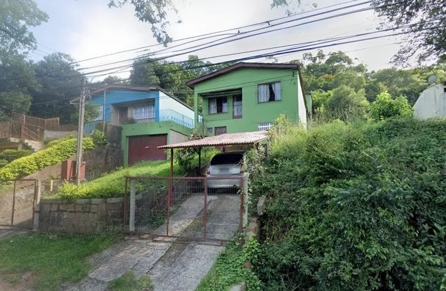 Foto 1 de Casa com 5 Quartos à venda, 281m² em Cascata, Porto Alegre